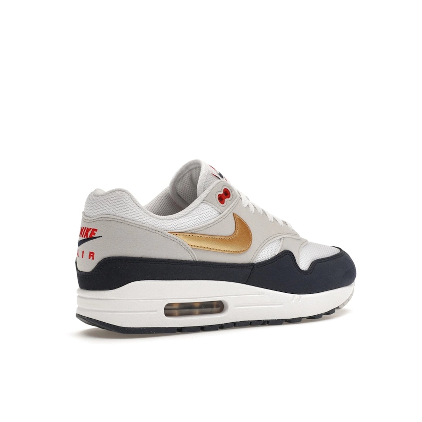 Nike Air Max 1 sneakers, back view, in blue, red, and white Olympic-inspired colors.