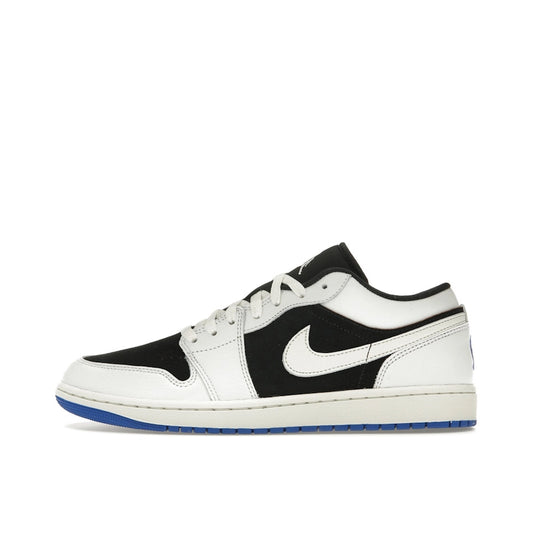 Jordan 1 Low Quai 54 (2024) sneakers, side view, model HQ0764-001, black and white accents.