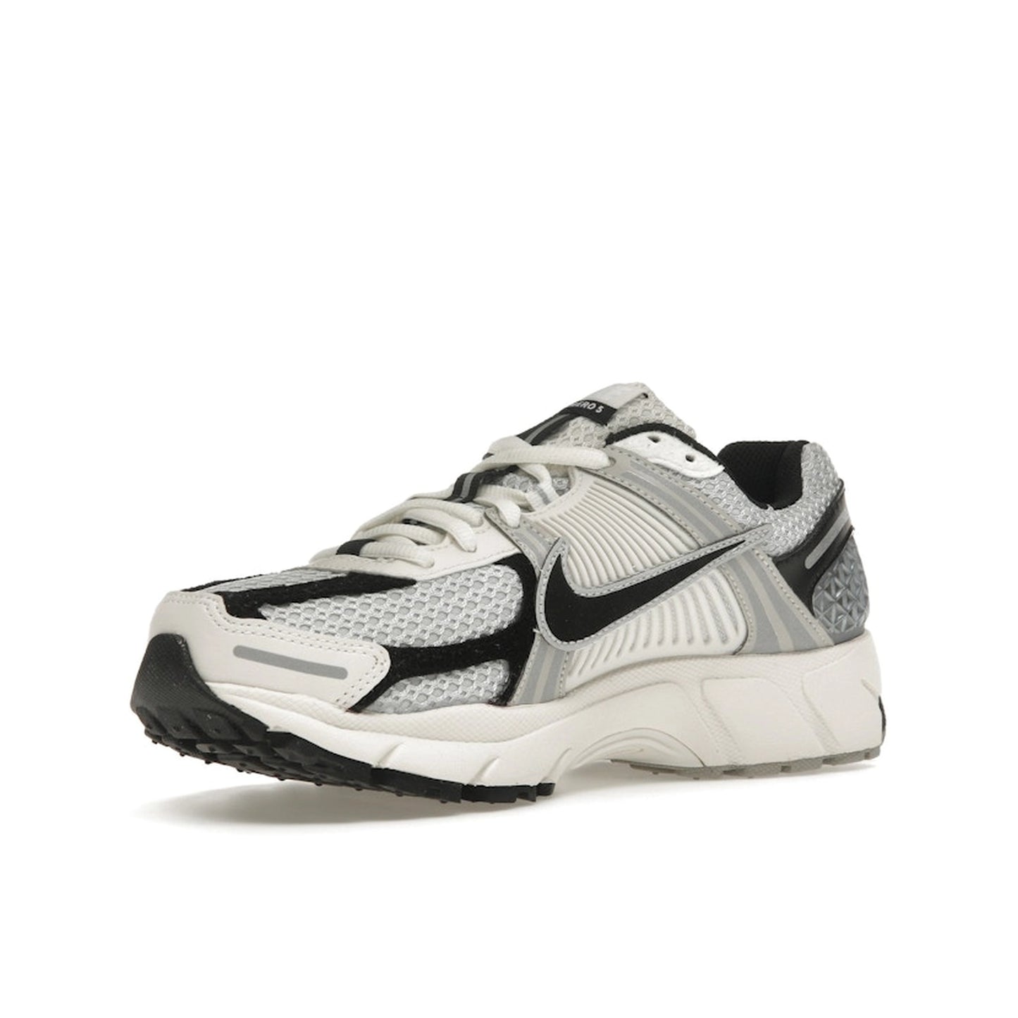 Nike Zoom Vomero 5 Women's sneakers, front view, in photon dust and black.