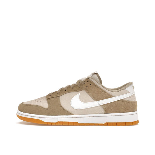 Nike Dunk Low SE Light Orewood, side view, in layered light beige with brown gum sole.