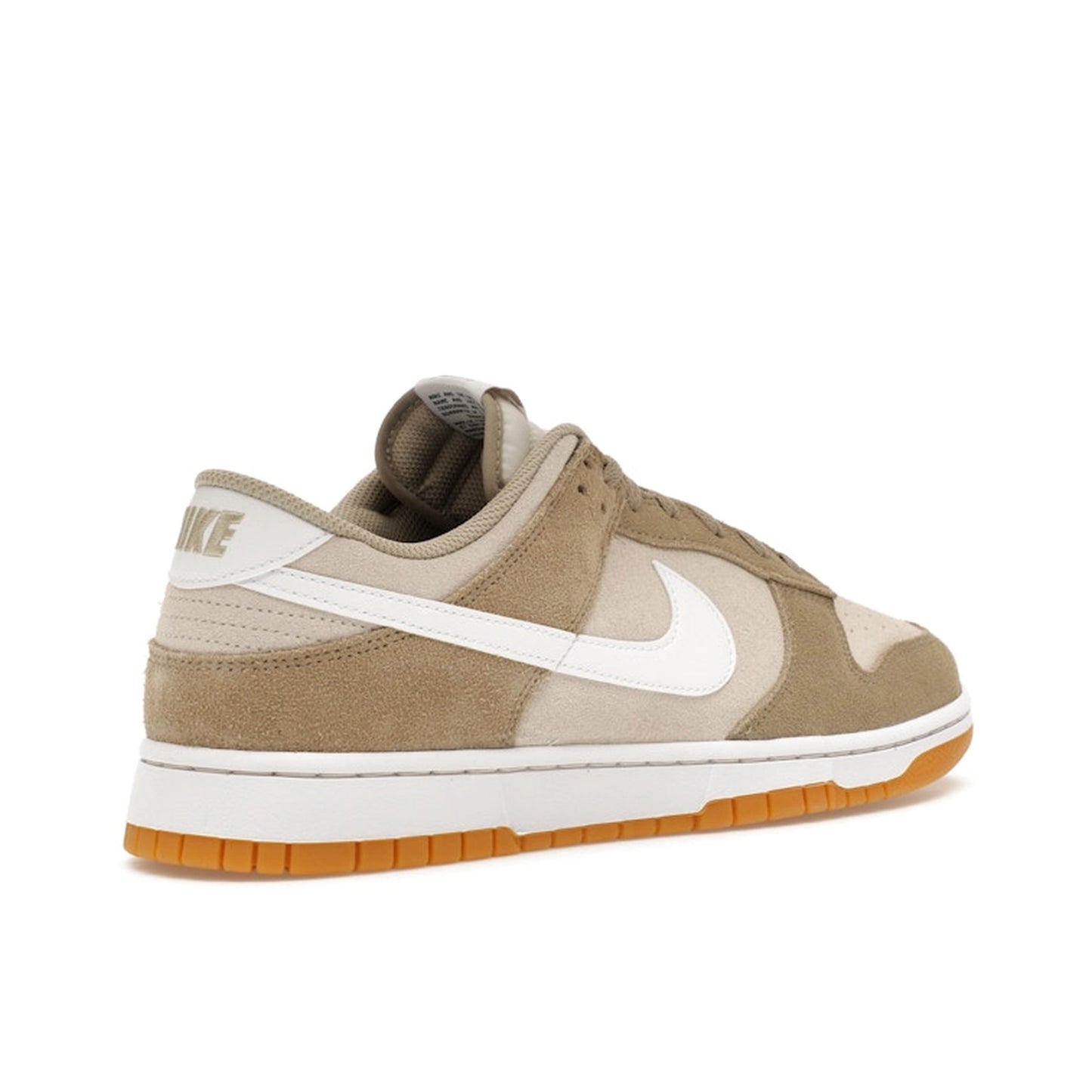 Nike Dunk Low SE Light Orewood, back view, in layered light beige with brown gum sole.