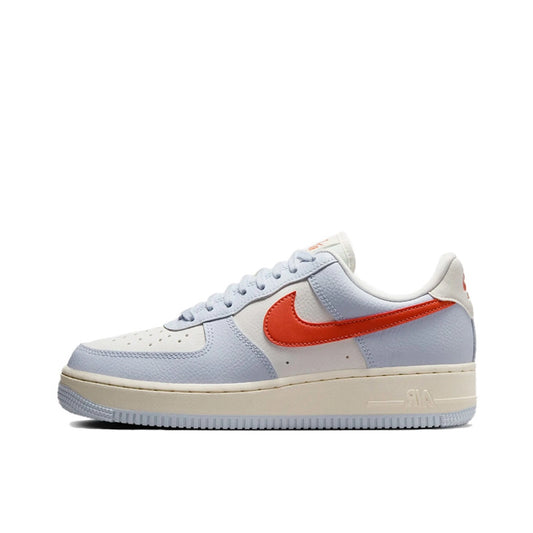 Nike Air Force 1 Low ’07 Football Grey, side view, in soft grey leather with vintage coral swoosh.