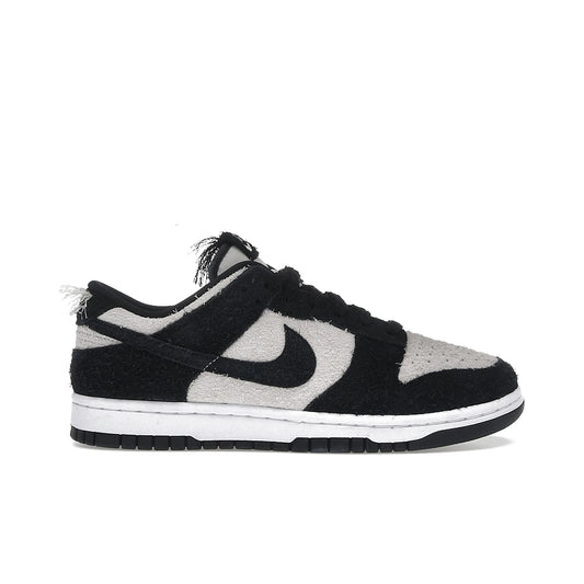 Nike Dunk Low Retro SE Panda-Monium men’s sneaker in white and black suede