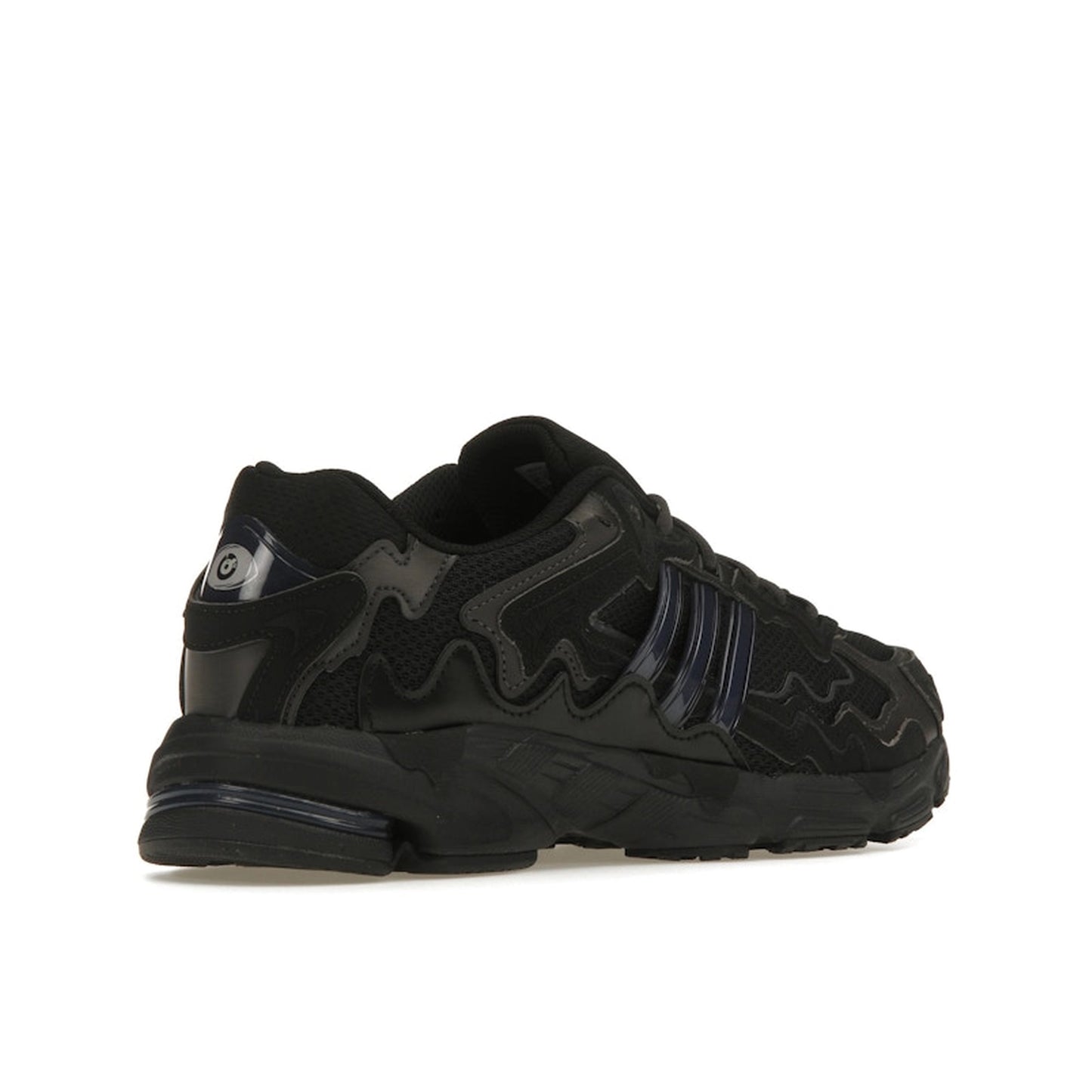 adidas Response CL Bad Bunny Triple Black sneakers, back view, in all-black with layered design.