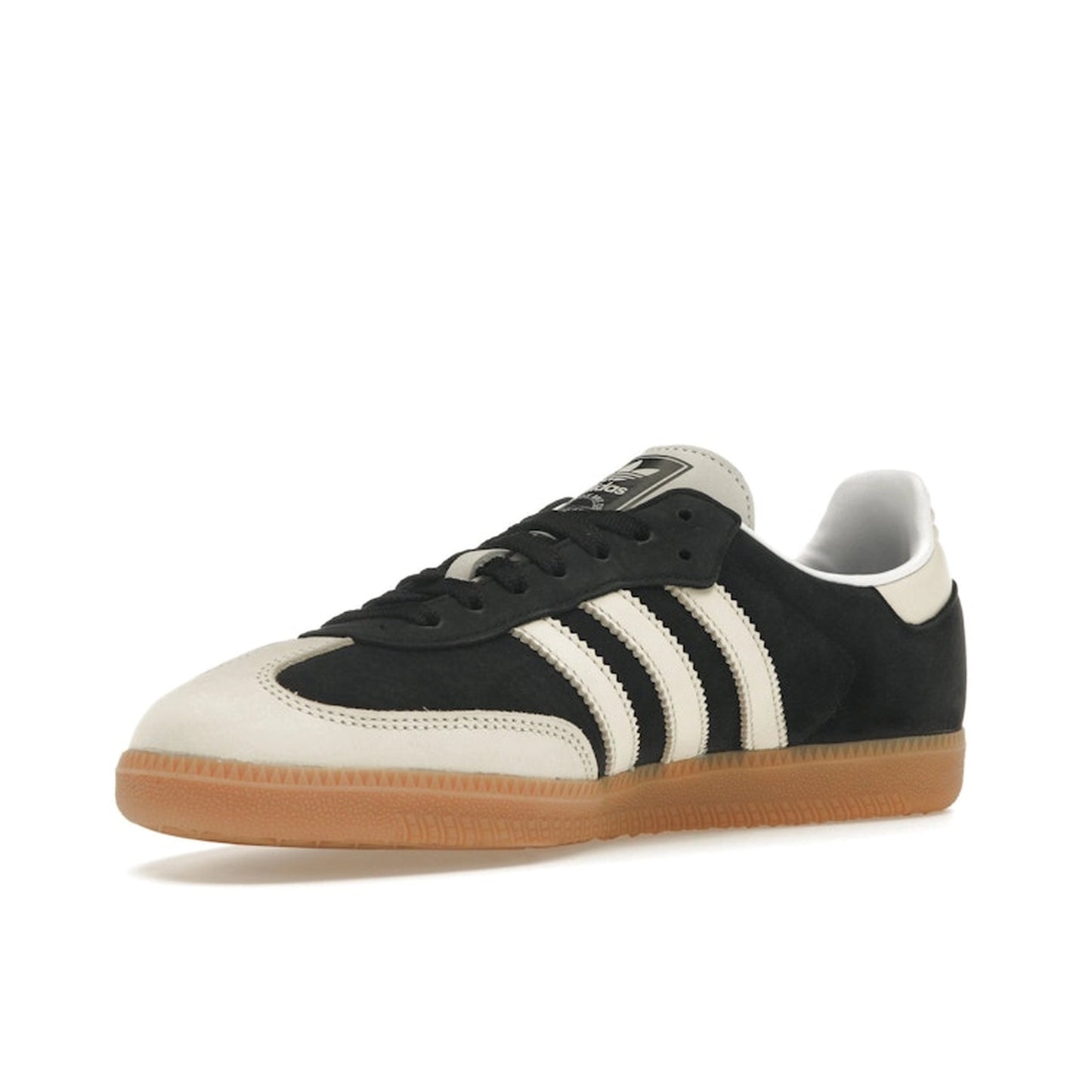 adidas Samba OG Women’s sneakers, front view, in black with white three stripes and tan sole.