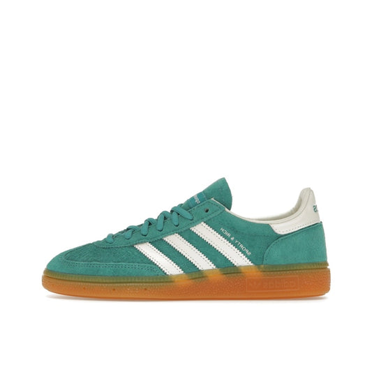 adidas Handball Spezial Sporty & Rich Green, side view, in premium green suede with white accents.