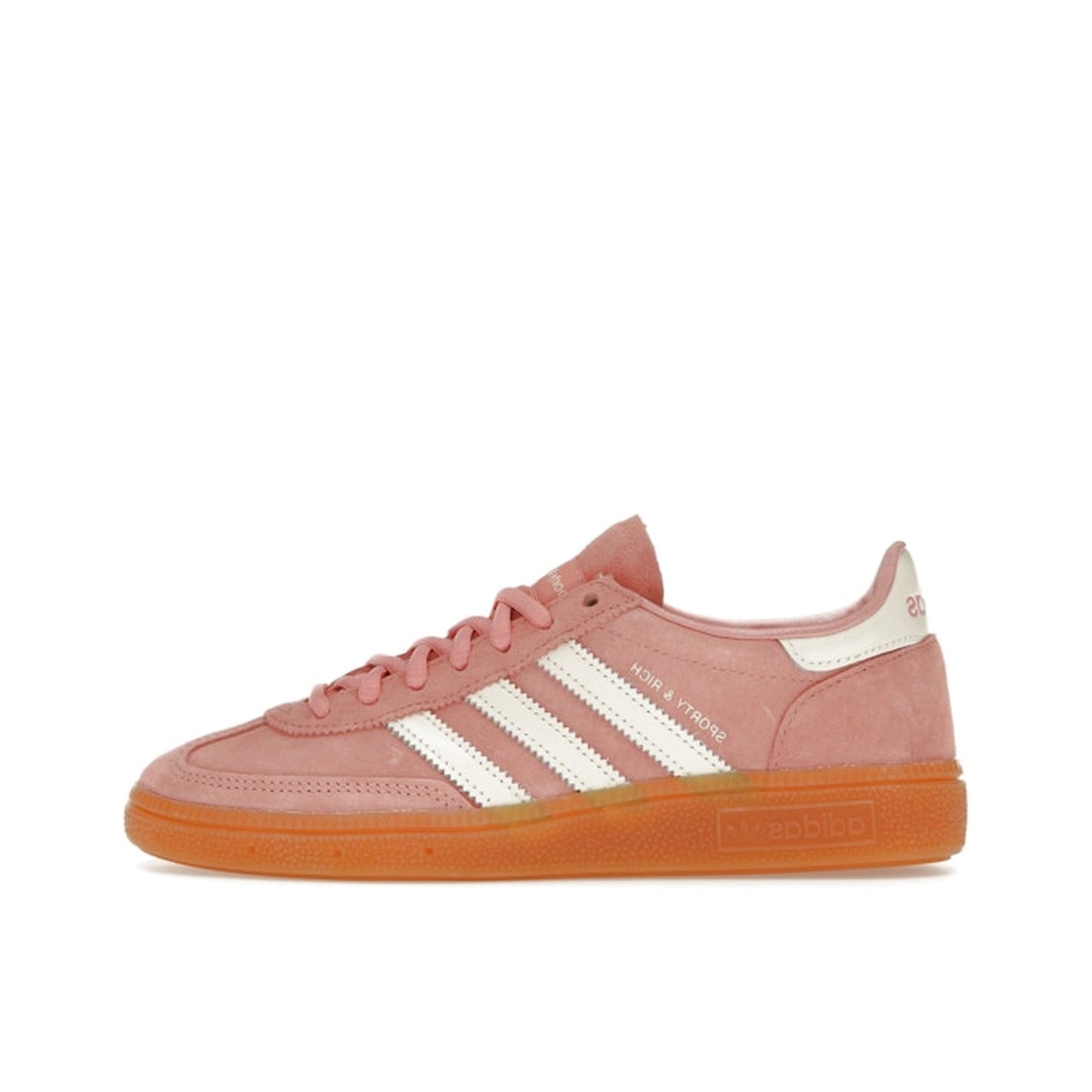 adidas Handball Spezial Sporty & Rich sneakers, side view, in soft pink with white stripes and gum sole.