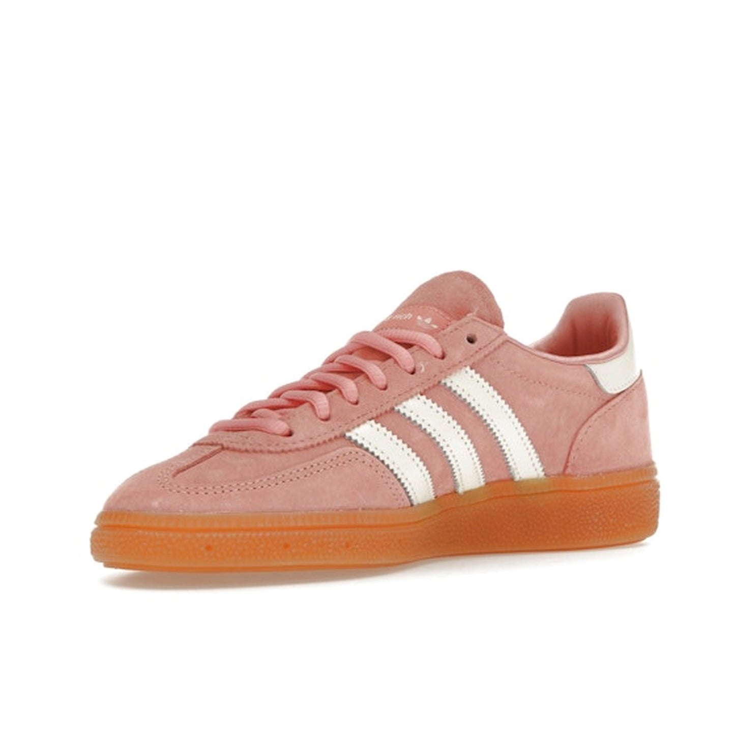 adidas Handball Spezial Sporty & Rich sneakers, front view, in soft pink with white stripes and gum sole.