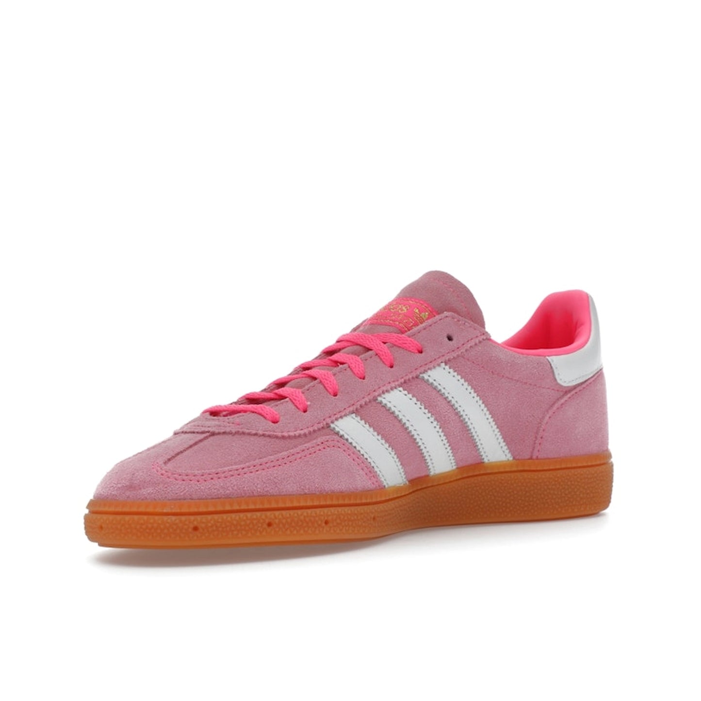 adidas Handball Spezial Women’s sneakers, front view, in lucid pink with white stripes.