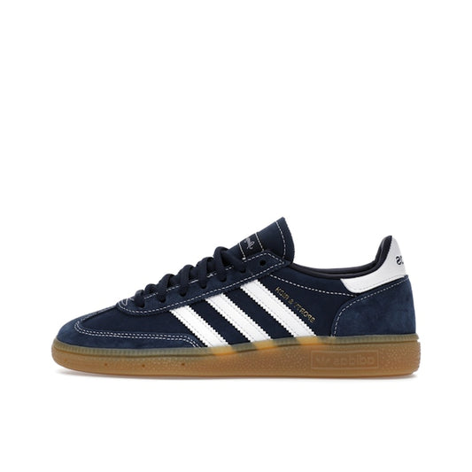 adidas Handball Spezial Sporty & Rich, side view, in deep indigo suede with white three stripes.