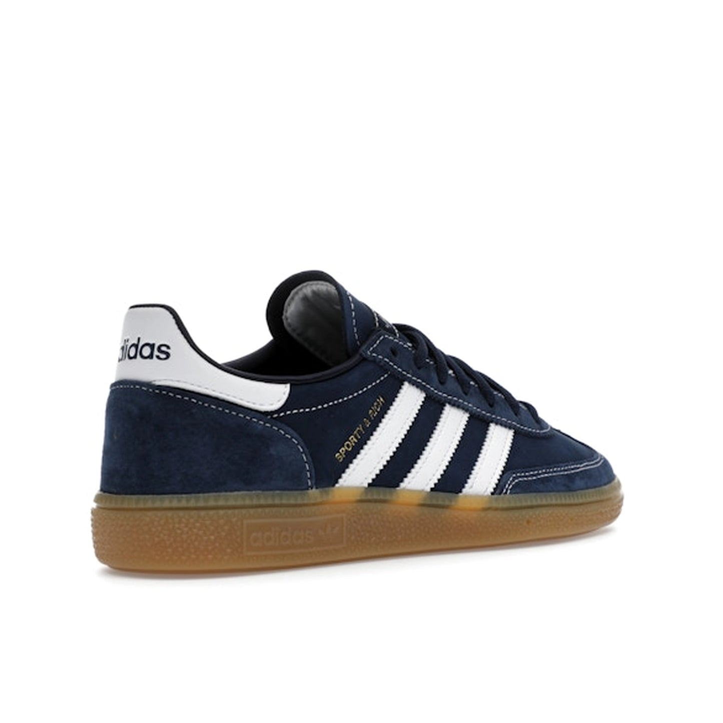 adidas Handball Spezial Sporty & Rich, back view, in deep indigo suede with white three stripes.