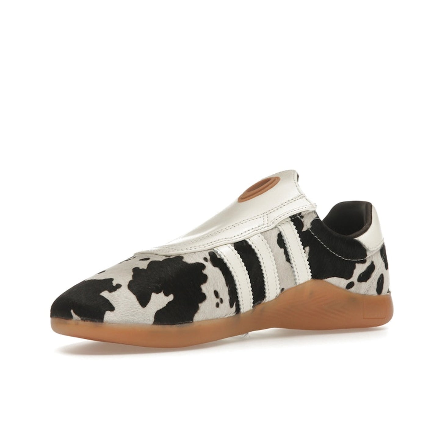 adidas Taekwondo Mei Women’s sneakers, front view, in white with black cow print details.