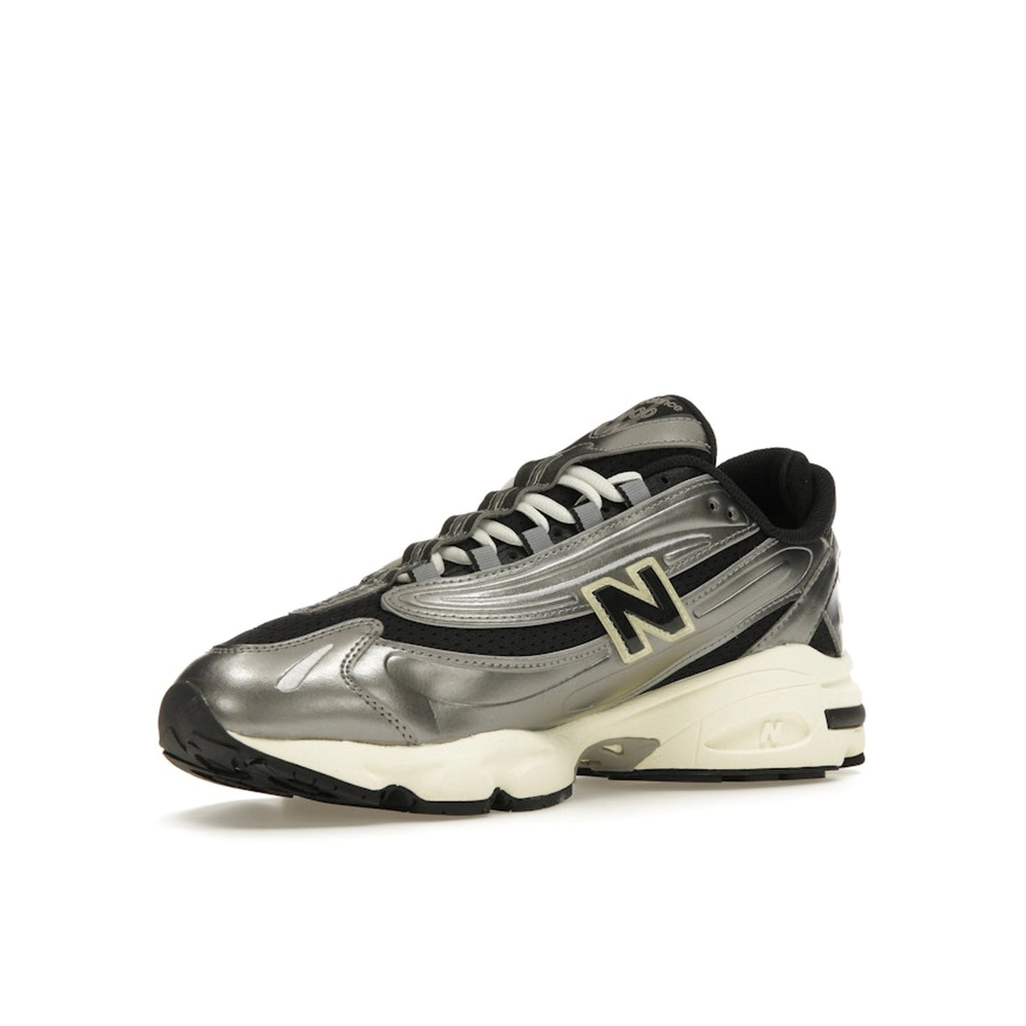 New Balance 1000 sneakers, front view, model M1000SL, silver metallic with grey accents.