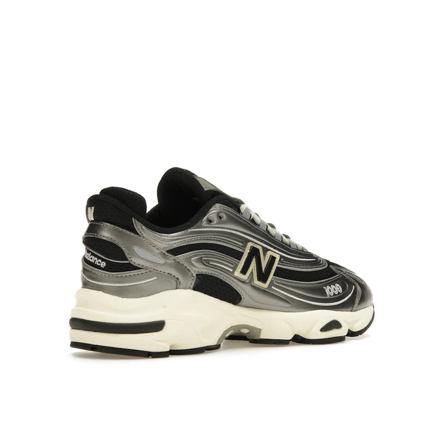 New Balance 1000 sneakers, back view, model M1000SL, silver metallic with grey accents.