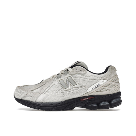 New Balance 1906D Protection Pack sneakers, side view, model M1906DB in turtledove with grey and white details.