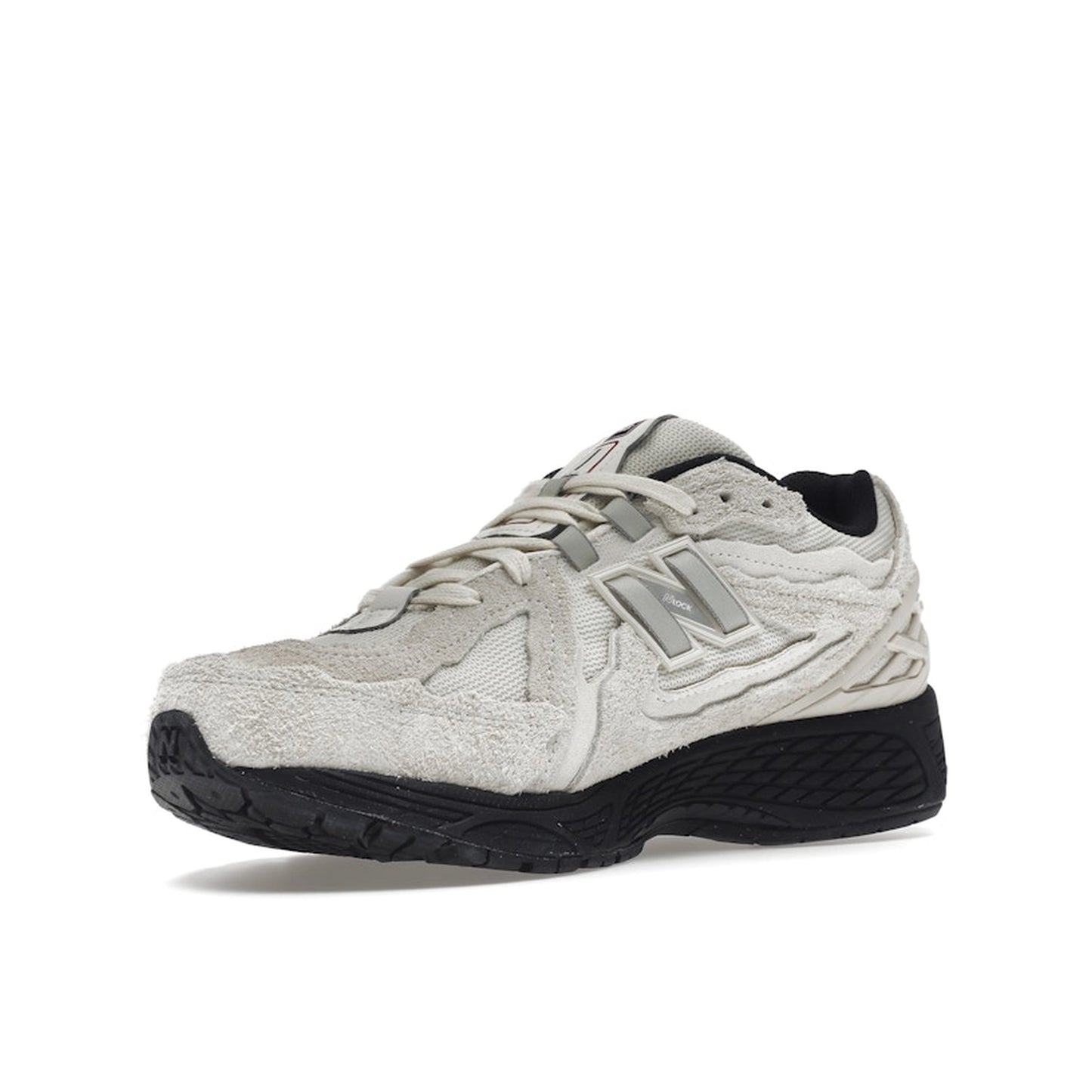 New Balance 1906D Protection Pack sneakers, front view, model M1906DB in turtledove with grey and white details.