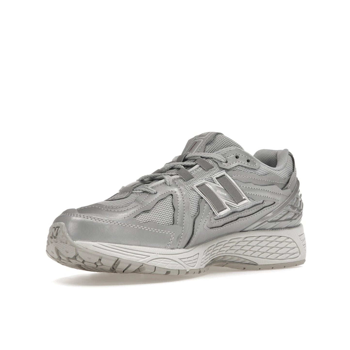 New Balance 1906D Protection Pack sneakers, front view, model M1906DH-1 in silver metallic with grey and white accents.