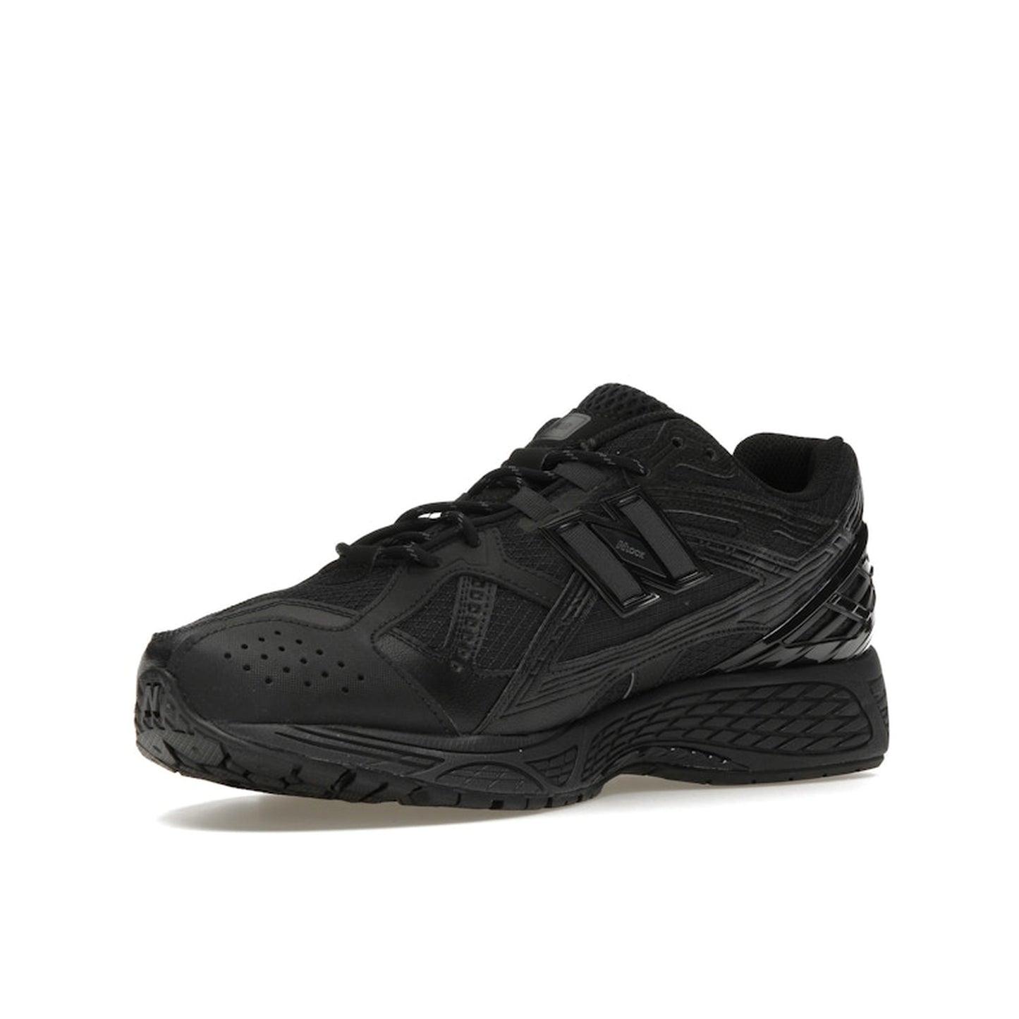 New Balance 1906U Triple Black sneakers, front view, in black with tonal elements.