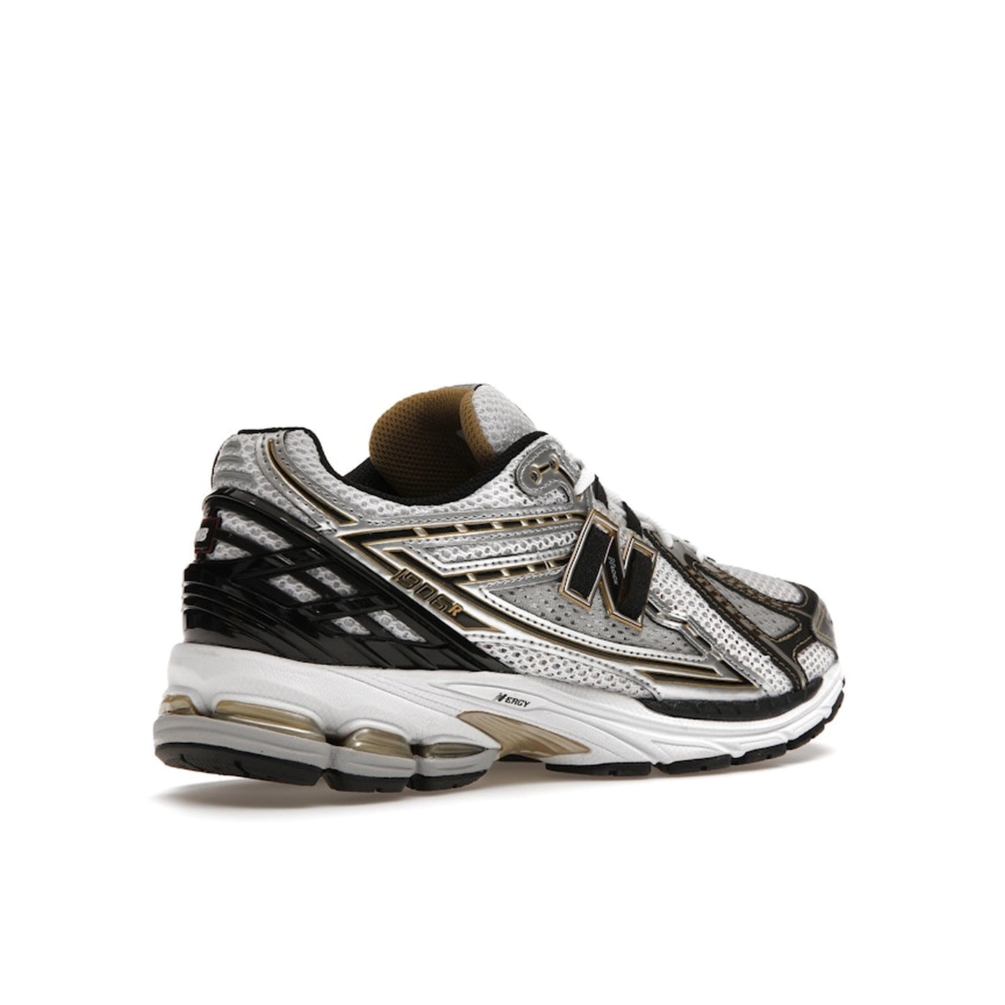 New Balance 1906R, back view, in white mesh with metallic gold overlays.