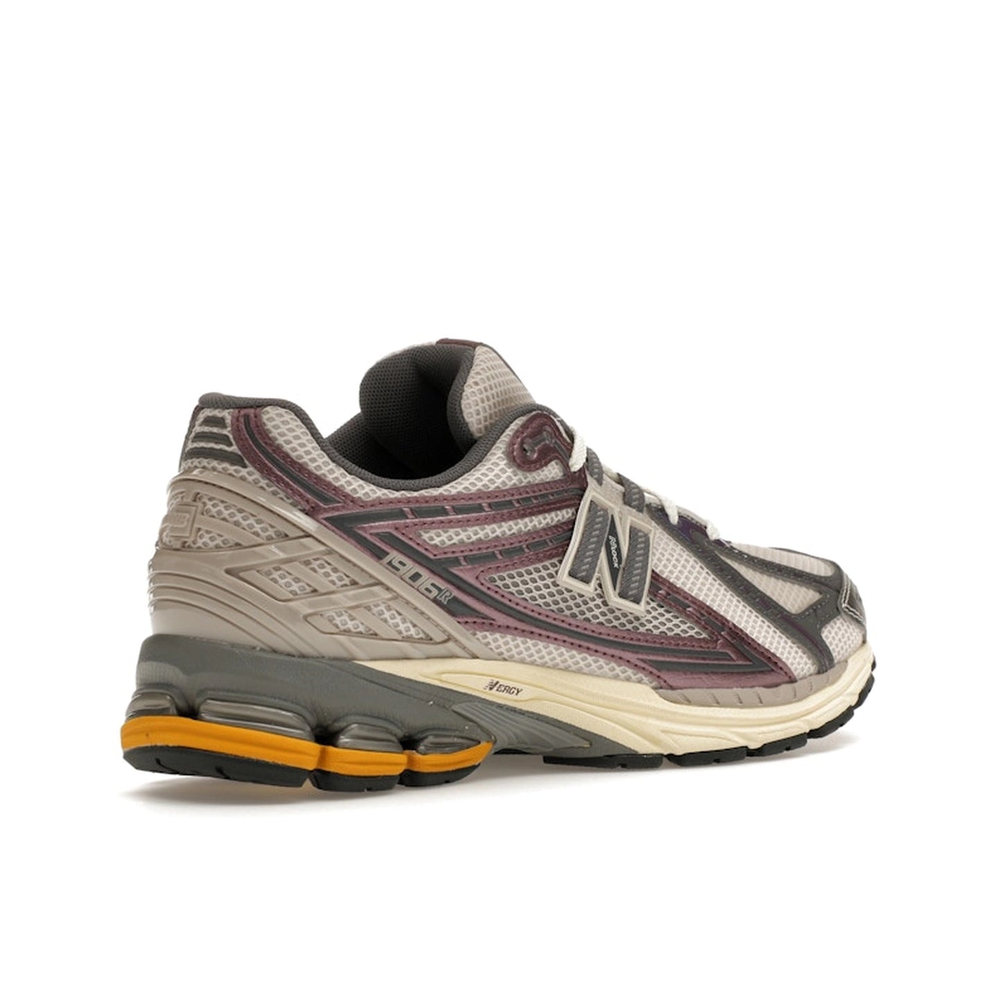 New Balance 1906R Licorice, back view, in rich brown tones with metallic accents and sporty design.