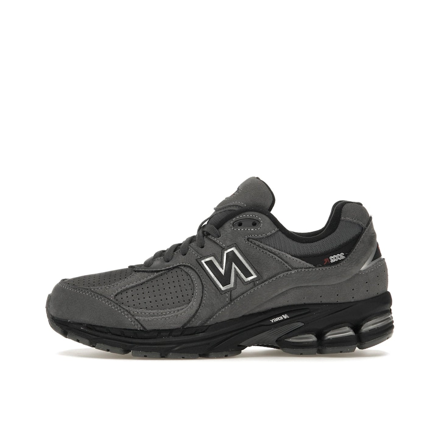 New Balance 2002R sneakers, side view, model M2002REH in castlerock with black details.