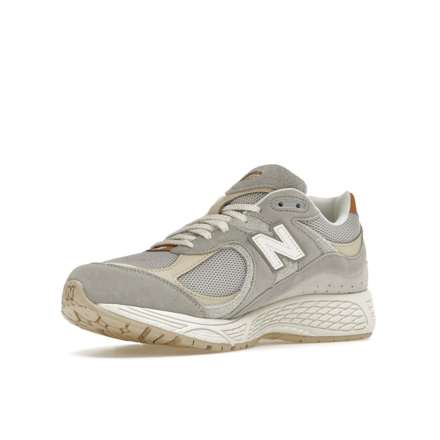 New Balance 2002R Concrete Grey sneakers, front view, in grey with tonal overlays.