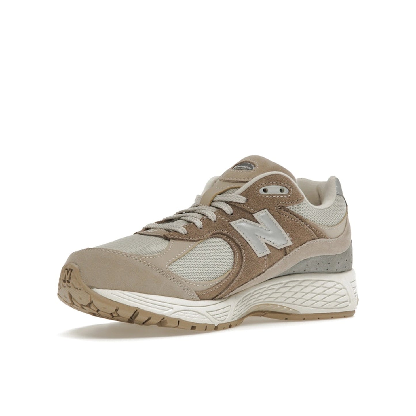 New Balance 2002R Driftwood Sandstone sneakers, front view, in beige and tan tones.