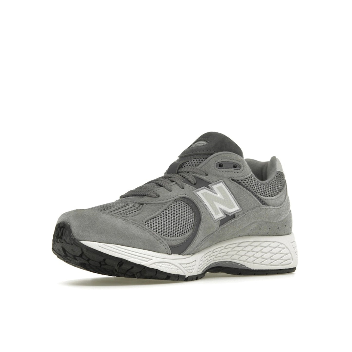 New Balance 2002R Steel Grey Orca, front view, in layered mesh and suede in grey and black.