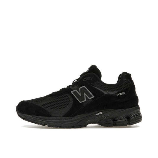 New Balance 2002R Mesh Black Metallic, side view, featuring breathable mesh and metallic overlays.