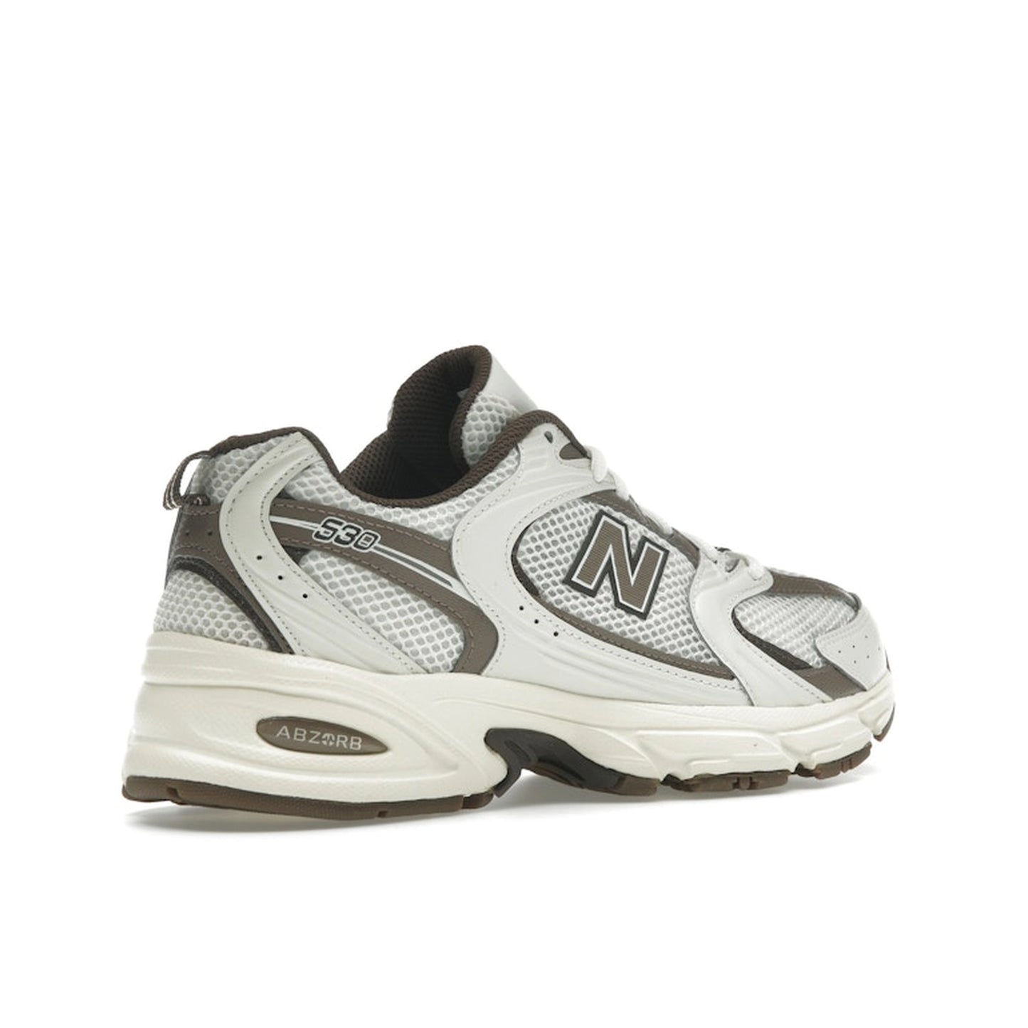 New Balance 530 Turtledove Mushroom, back view, in earthy beige and grey with retro runner profile.