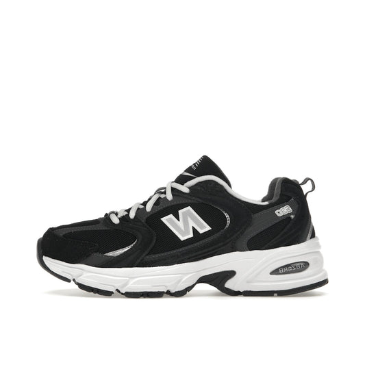 New Balance 530 Classic, side view, in black with silver and grey details.