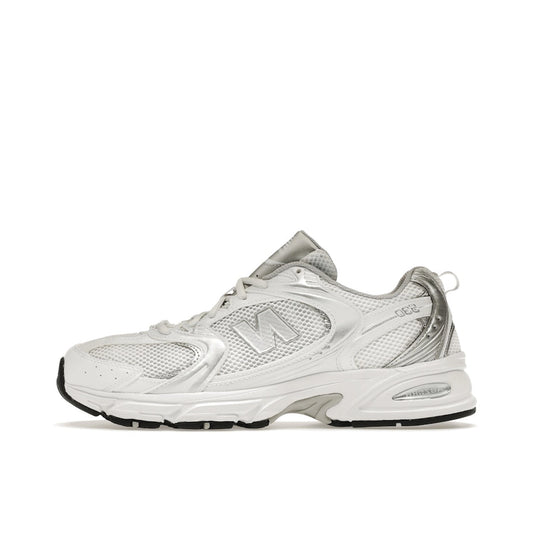 New Balance 530 MR530EMA, side view, in Munsell white with silver accents and retro running style.