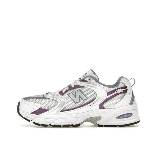 New Balance 530 sneakers, side view, in white mesh with violet accents and silver overlays.