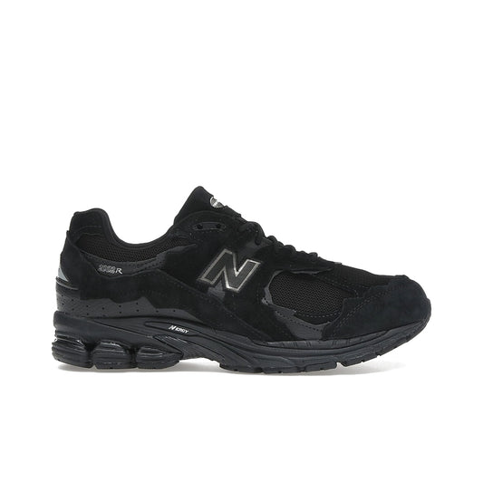 New Balance 2002R Protection Pack men’s sneaker in black with black metallic accents, leather