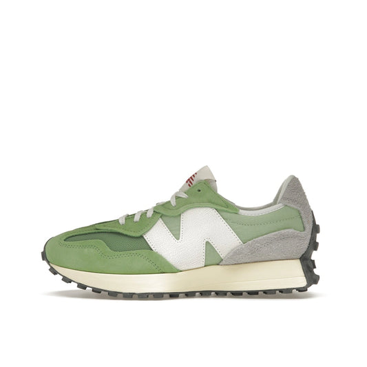 New Balance 327 sneakers, side view, in chive green and avocado with white details.
