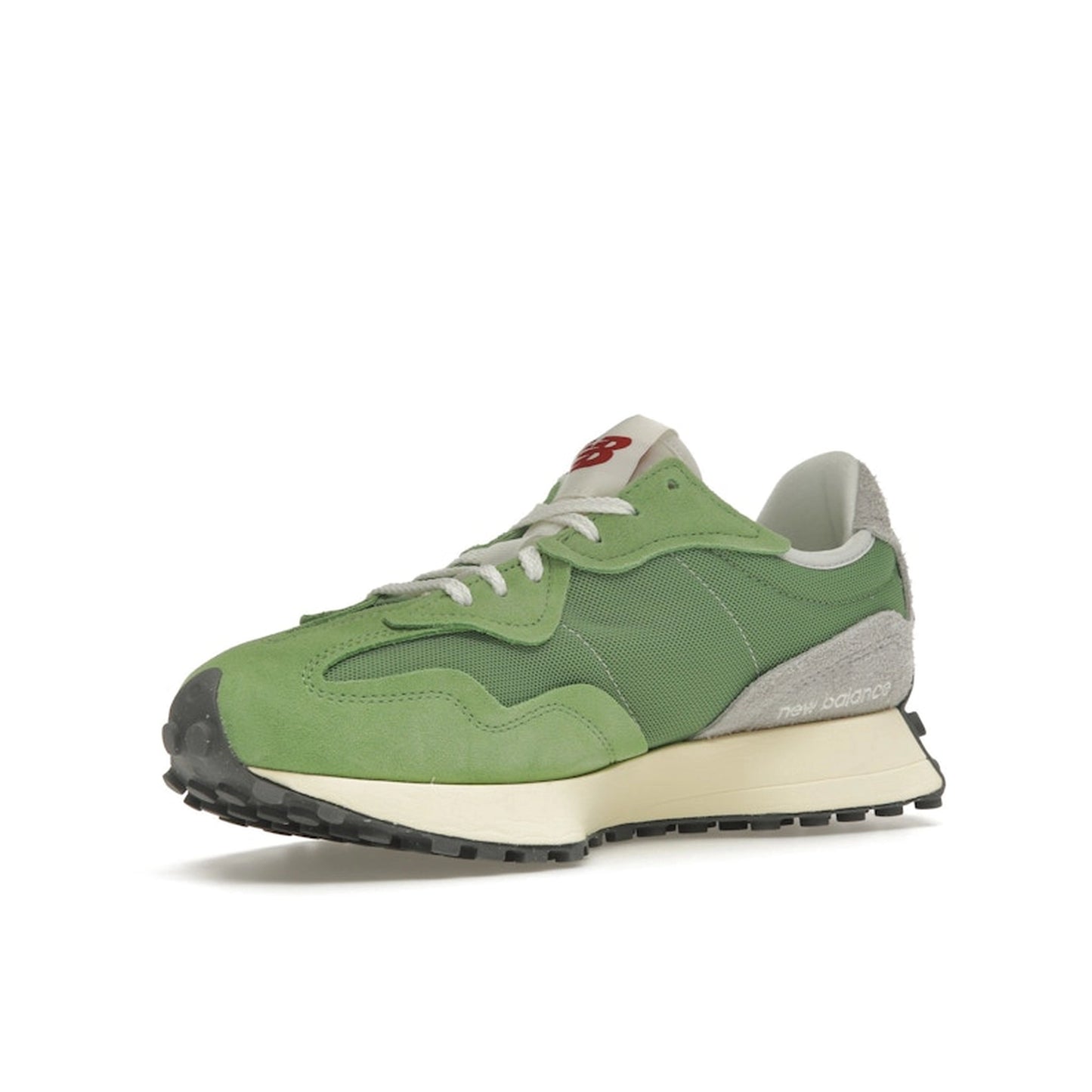 New Balance 327 sneakers, front view, in chive green and avocado with white details.