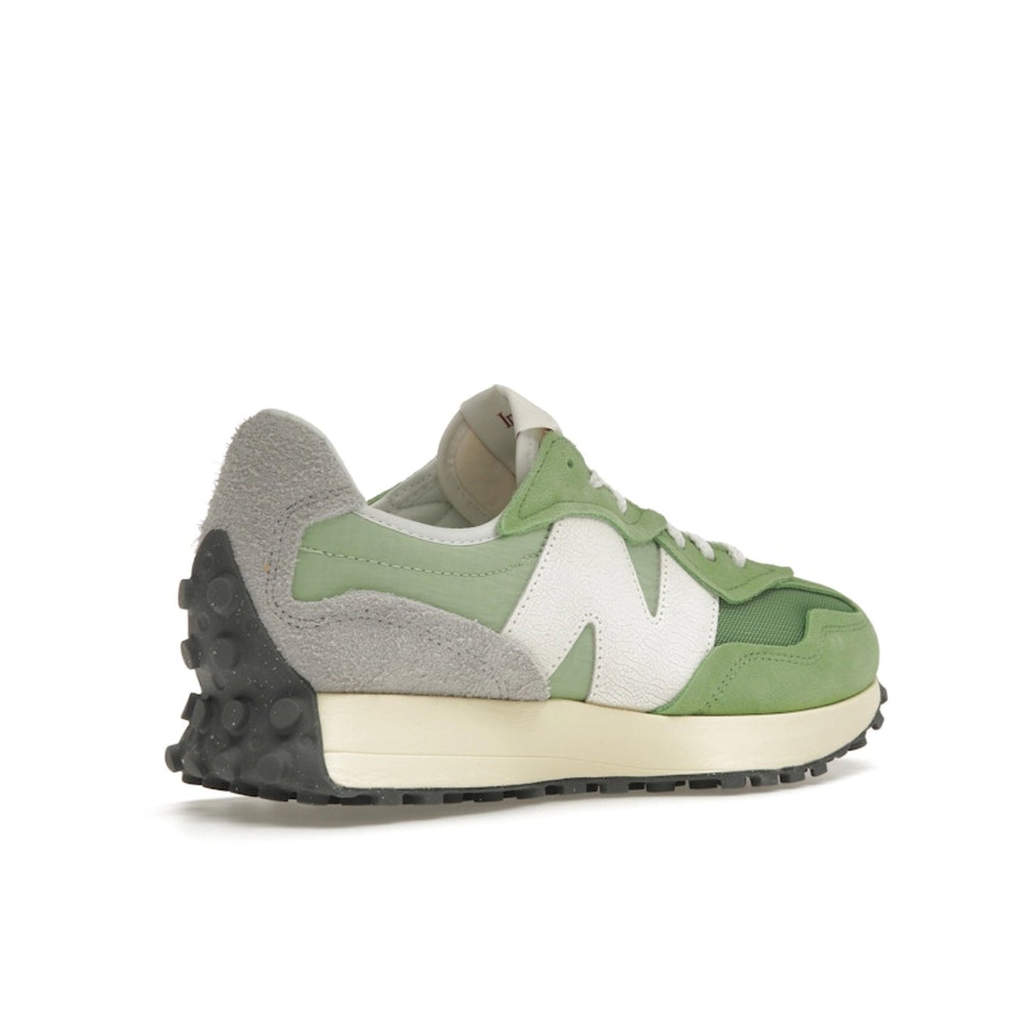 New Balance 327 sneakers, back view, in chive green and avocado with white details.