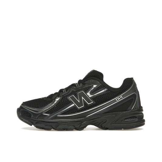 New Balance 740v2, side view, in black with grey details and reflective silver highlights.