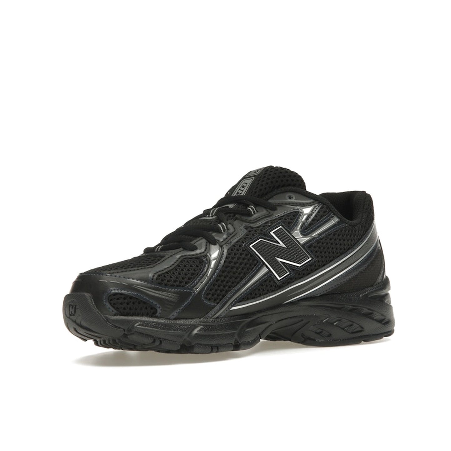 New Balance 740v2, front view, in black with grey details and reflective silver highlights.
