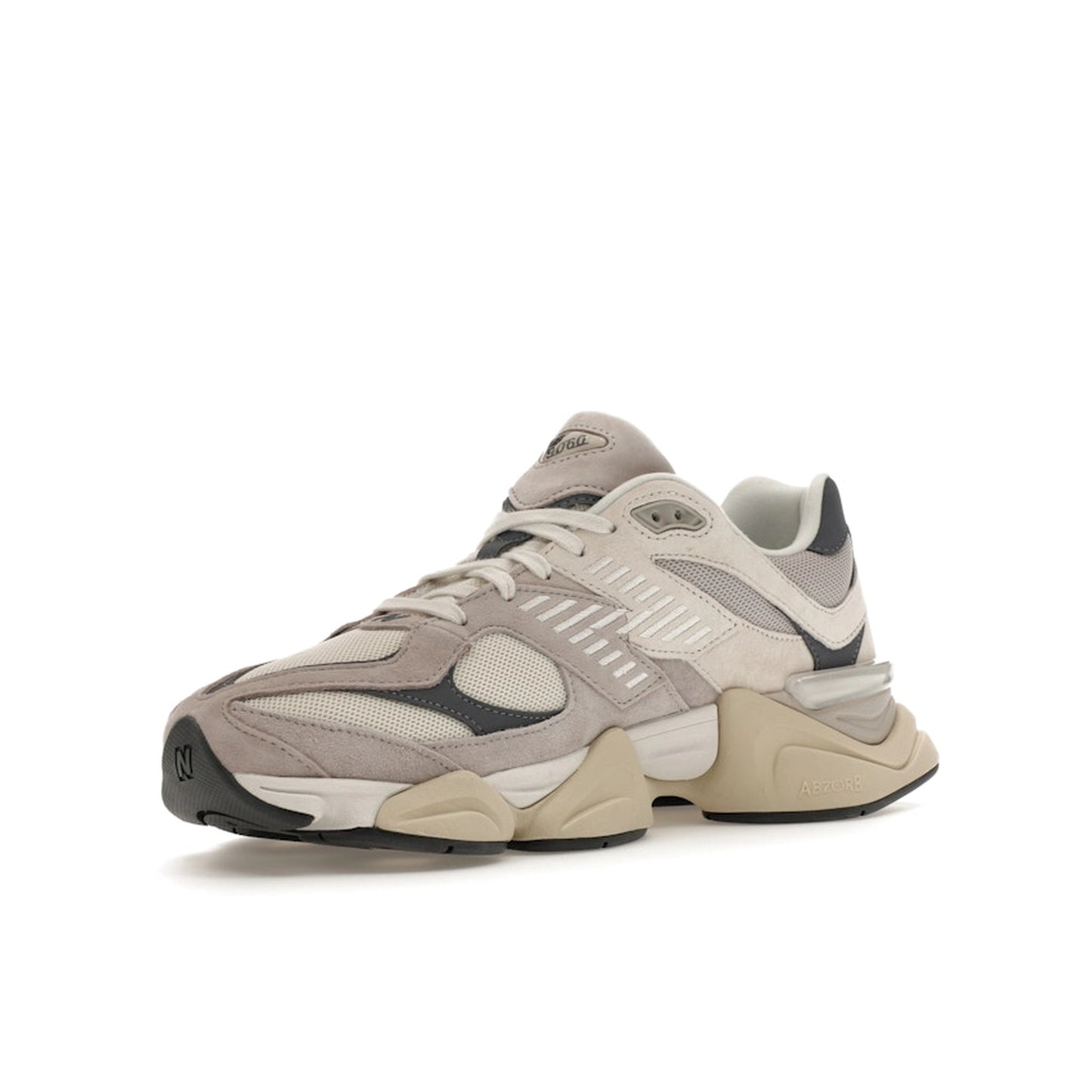 New Balance 9060 sneakers, front view, in moonrock grey with linen beige accents.