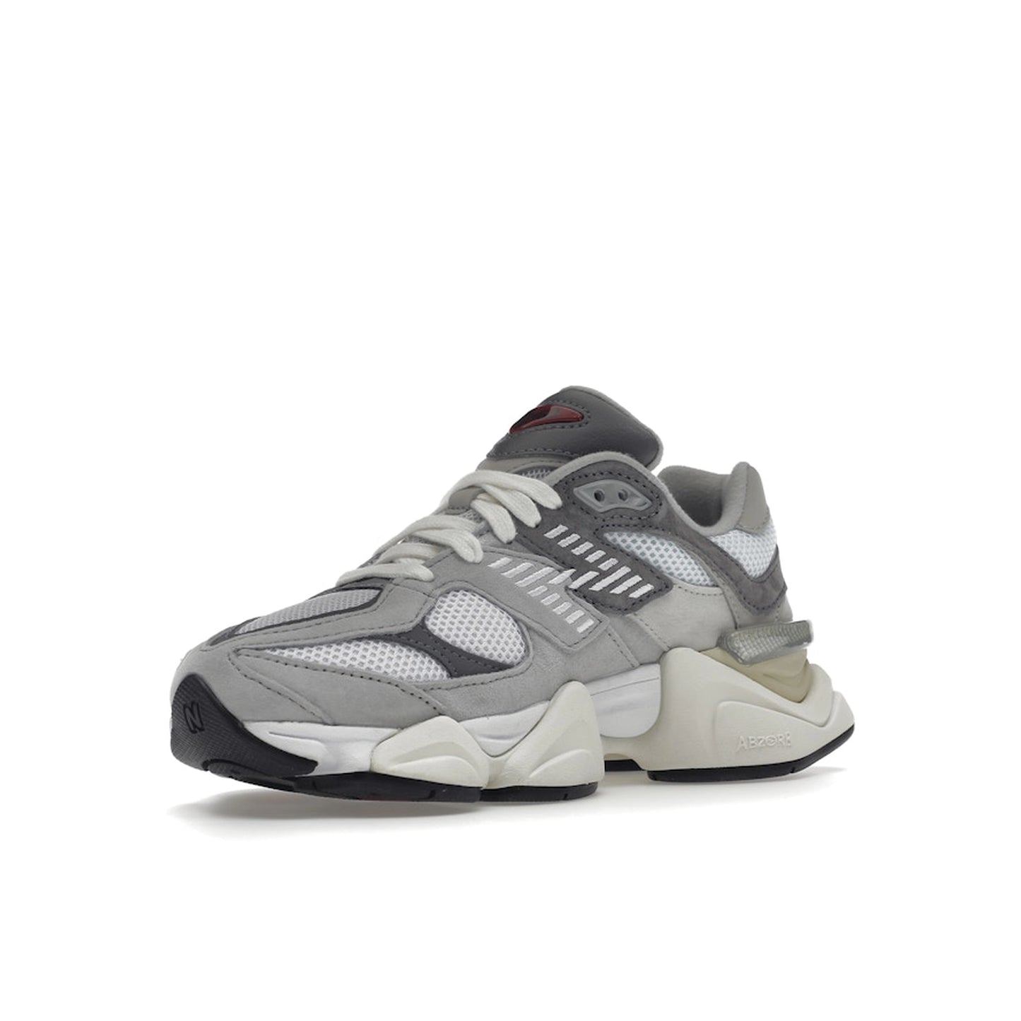 New Balance 9060 sneakers, front view, in rain cloud grey with layered mesh and suede.