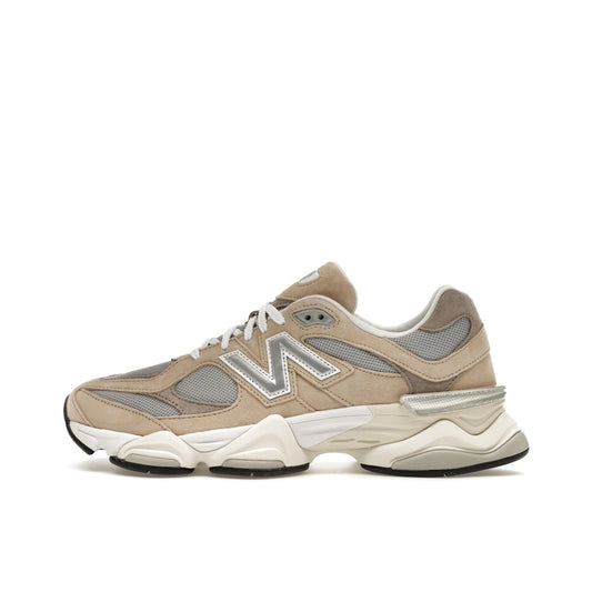 New Balance 9060, side view, in beige and grey with layered suede and mesh upper.
