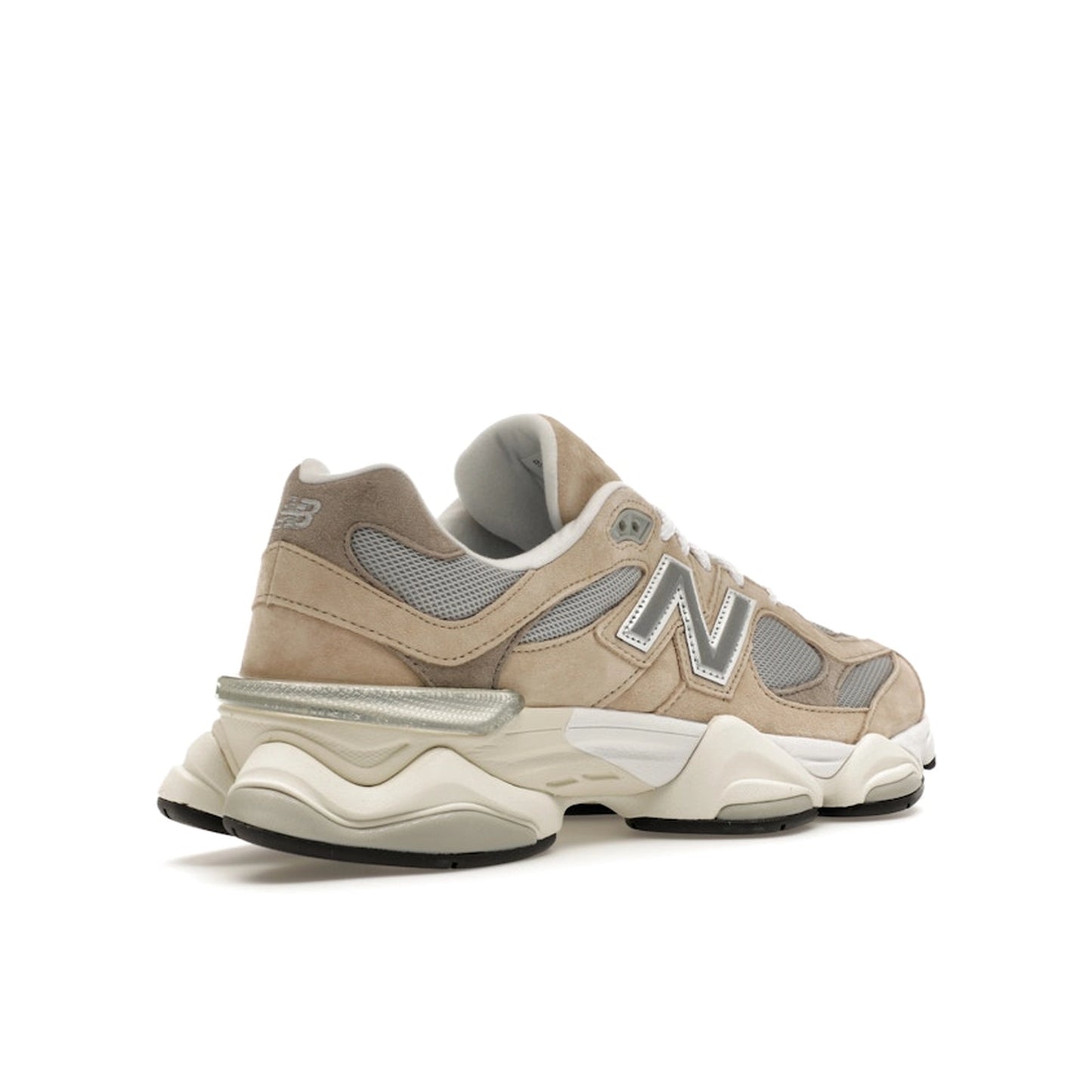 New Balance 9060, back view, in beige and grey with layered suede and mesh upper.
