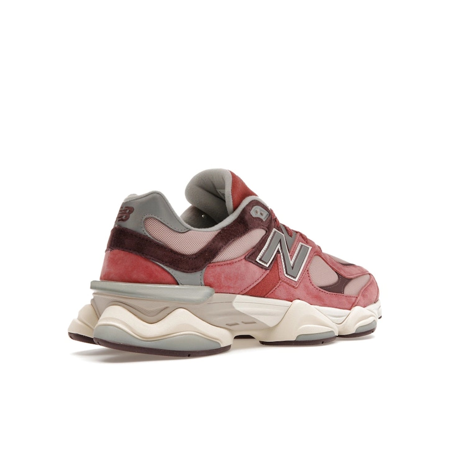New Balance 9060 sneakers, back view, model U9060TRU in cherry blossom with beige and white details.