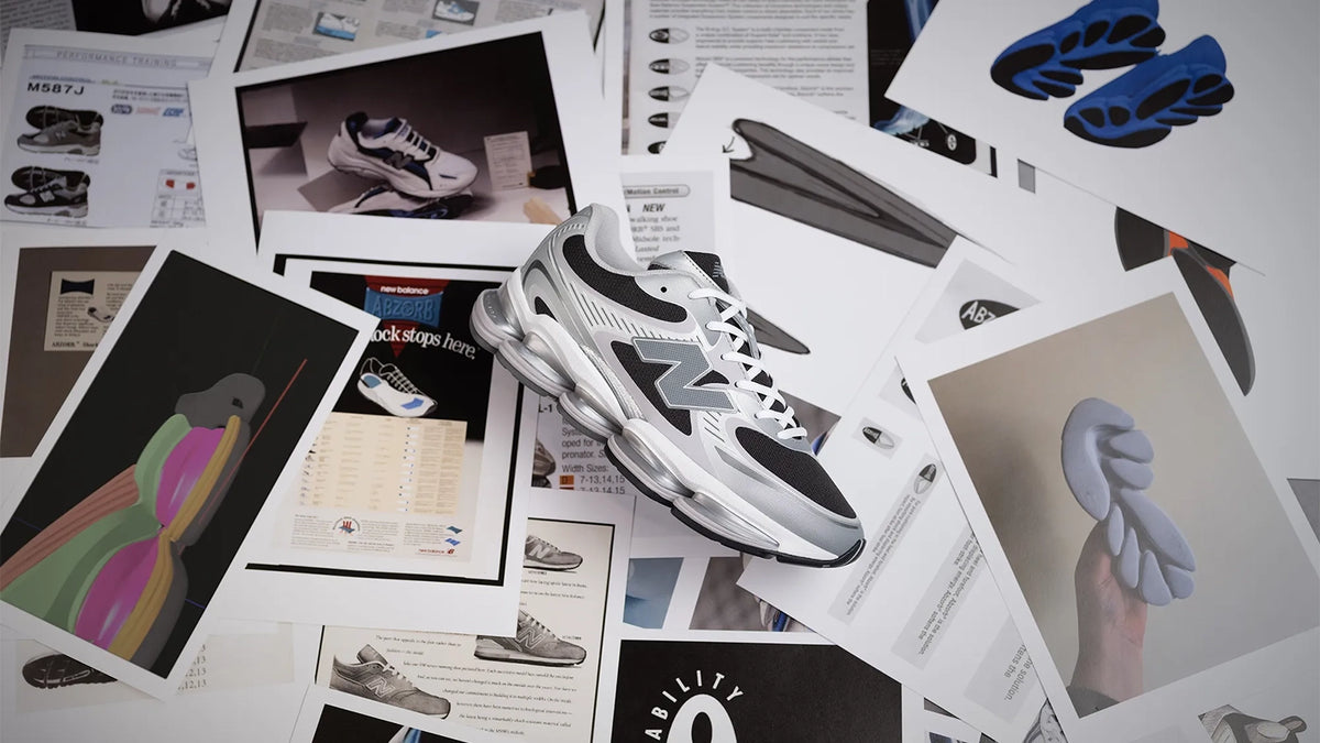 Grey and black New Balance 2000 sneaker in a futuristic graphic composition
