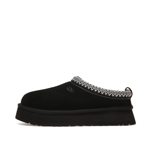 UGG Tazz Women's Slipper, side view, model 1122553-BLK, featuring a black upper with a platform sole.