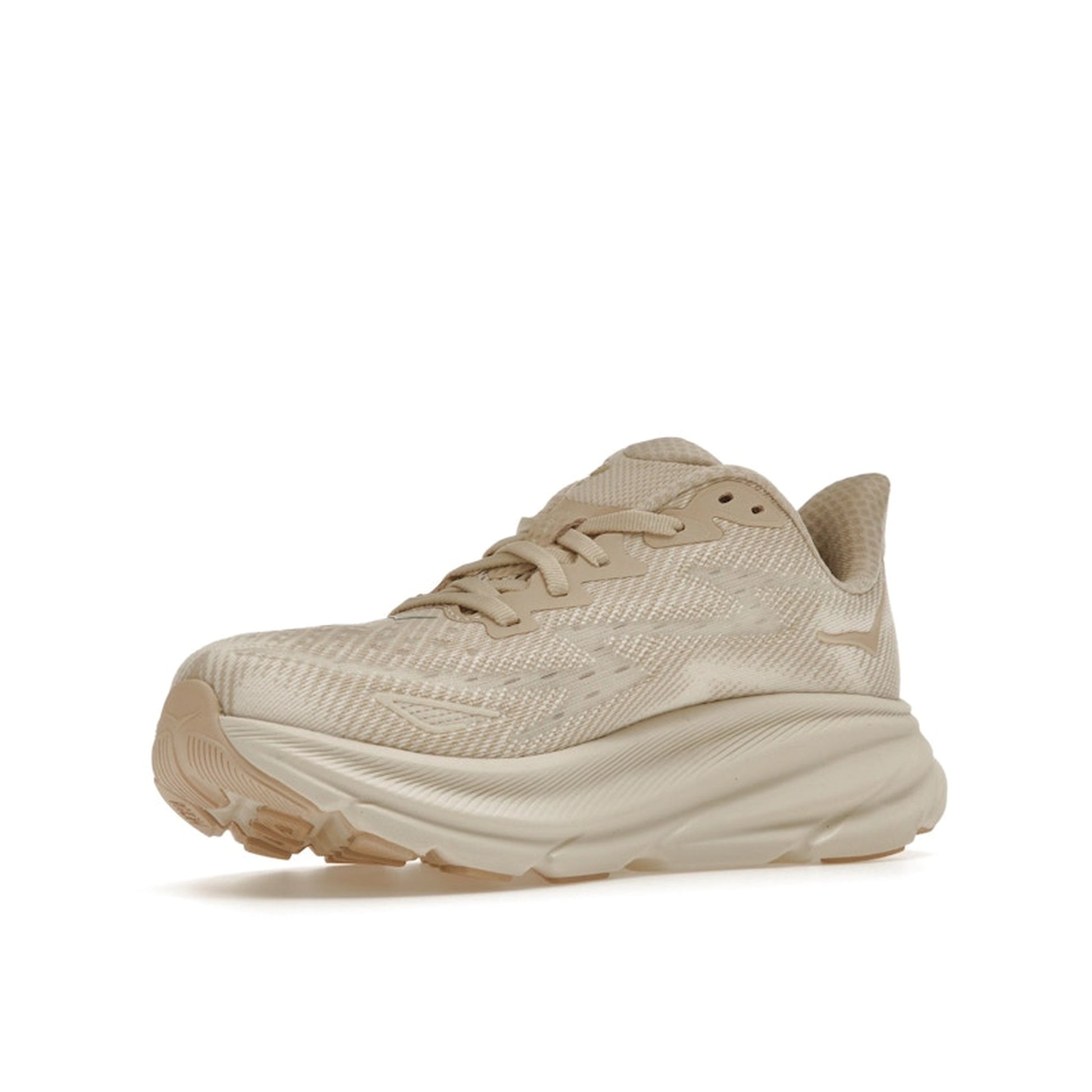 Hoka One One Clifton 9 sneakers for women, front view, model 1127896-SSEG, in shifting sand color with a comfortable fit.