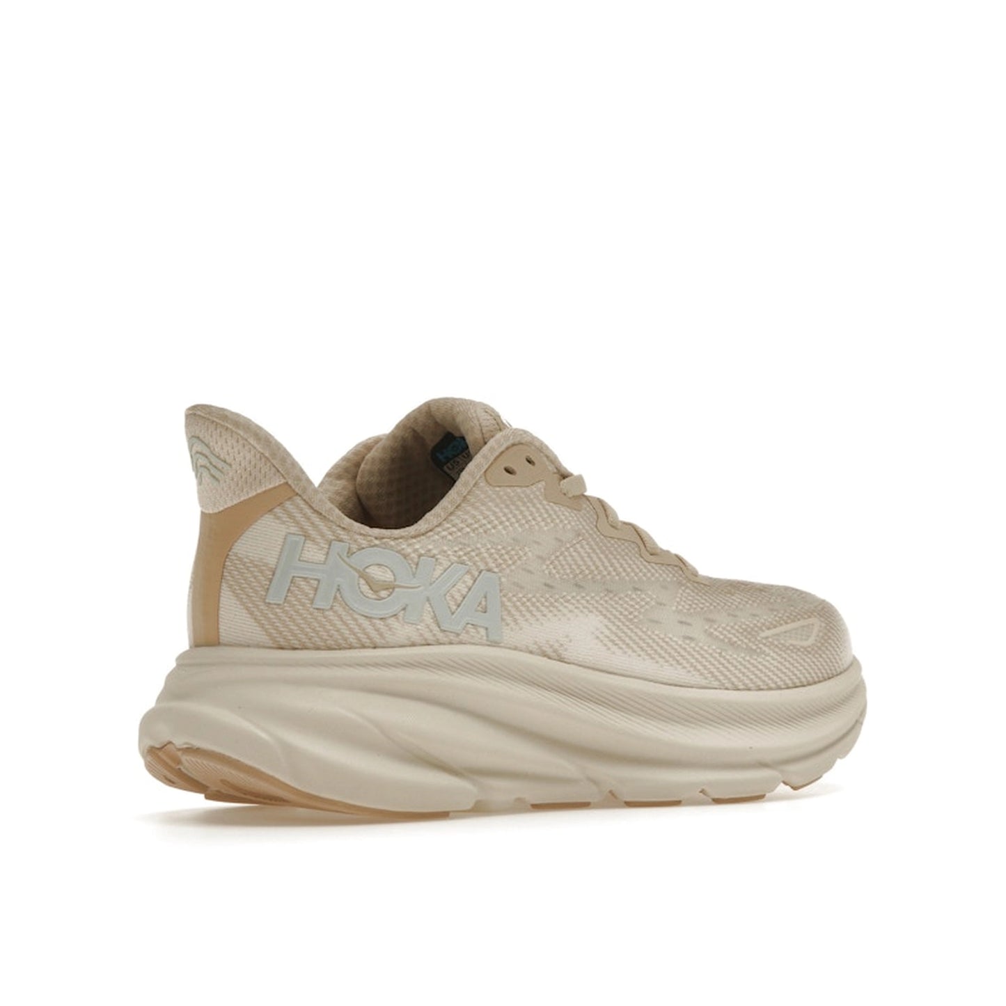 Hoka One One Clifton 9 sneakers for women, back view, model 1127896-SSEG, in shifting sand color with a comfortable fit.