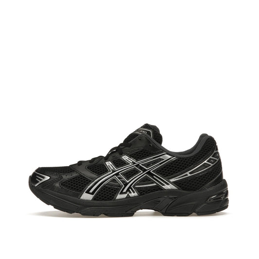 ASICS Gel-1130, side view, in black with silver tones and GEL cushioning technology.