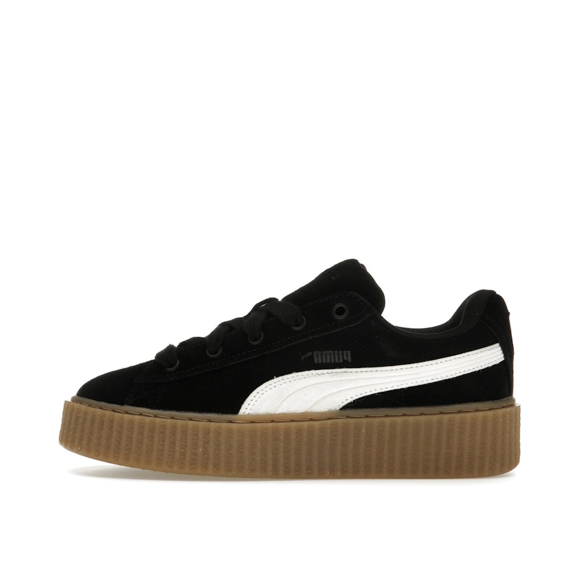 Puma Creeper Phatty Rihanna Fenty sneakers, side view, model 396403-01, in black with platform sole.